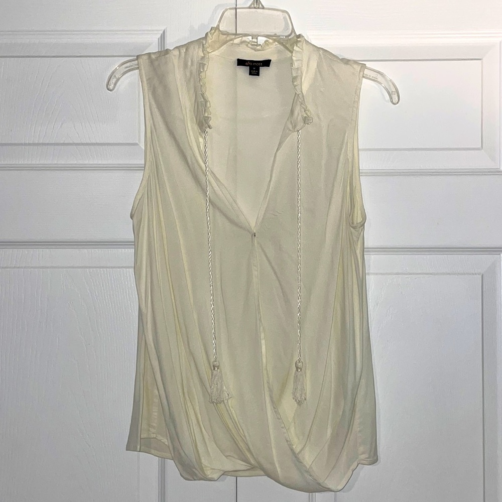 Ella Moss sleeveless cream blouse with cord tassel tie and pleated collar.